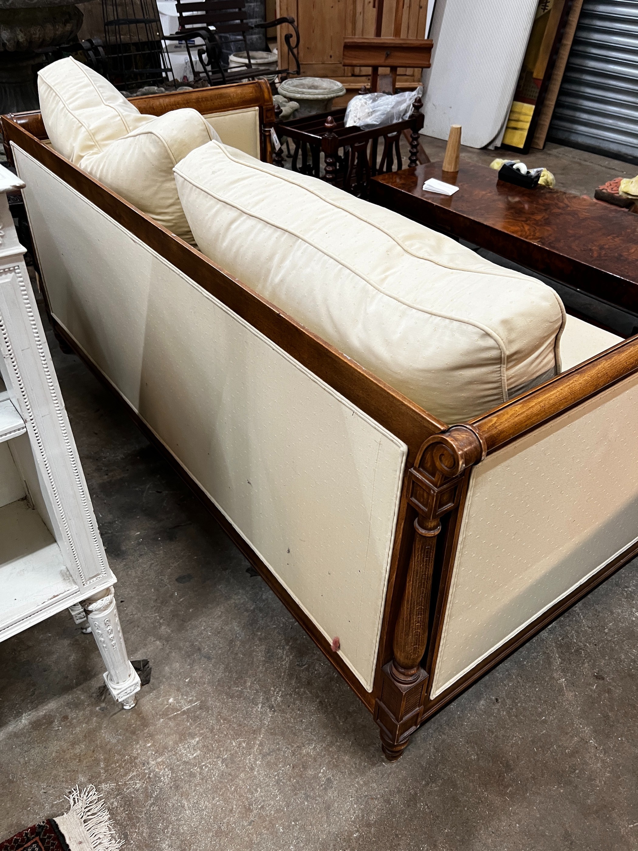 A reproduction walnut and beech two seater settee, length 174cm, depth 86cm, height 74cm